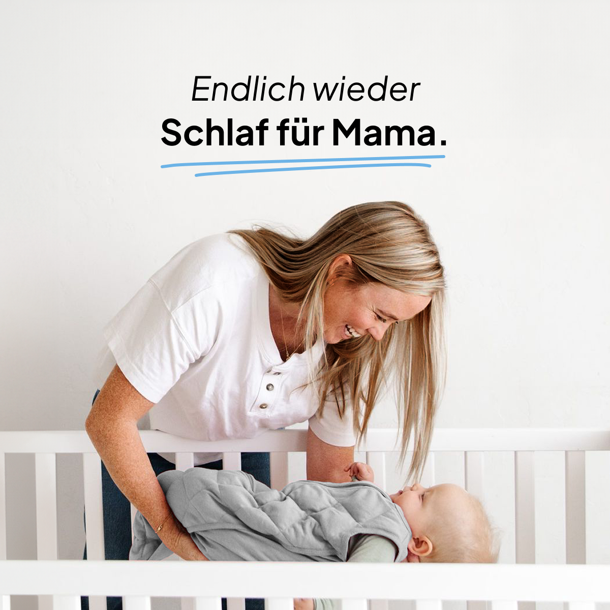 Mama mit Baby in Gewichtsschlafsack